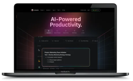 Taskade website displayed on a Macbook